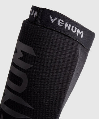 Protège-tibias avec protège-pieds à chaussette Venum Kontact