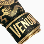 Gants de boxe Venum Vol du Dragon Noir-bronze 